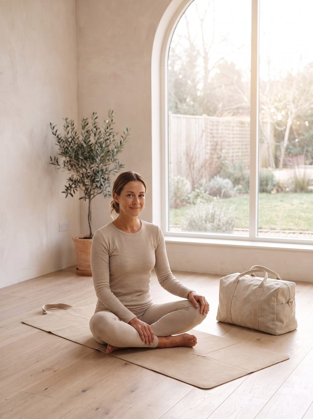 Woman practising on the sand Foldable Travel Yoga Mat in a bright room
