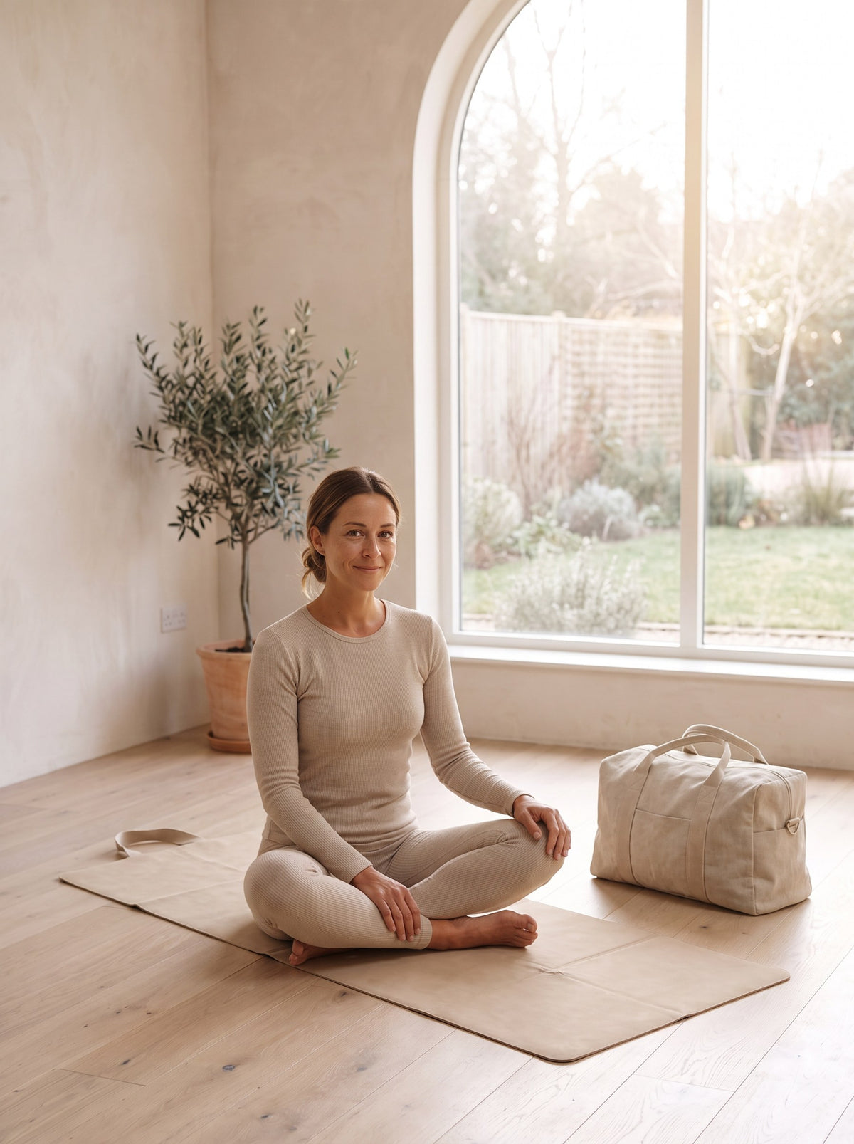 Woman practising on the sand Foldable Travel Yoga Mat in a bright room